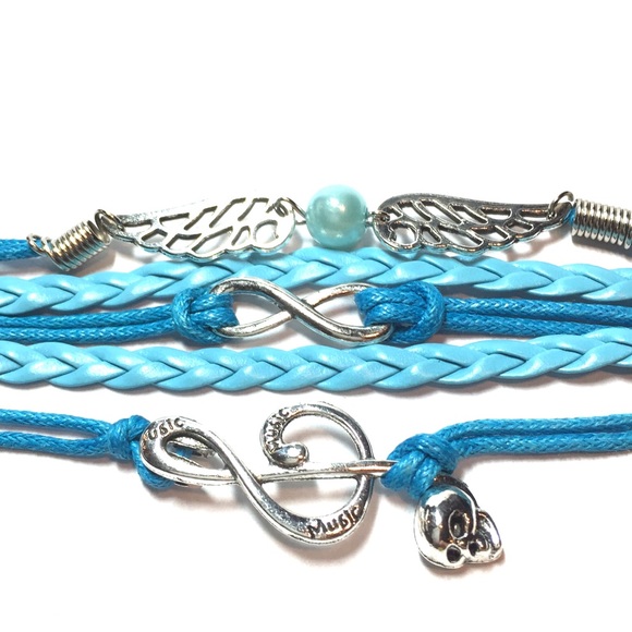 Jewelry - Blue treble clef infinity wings bracelet