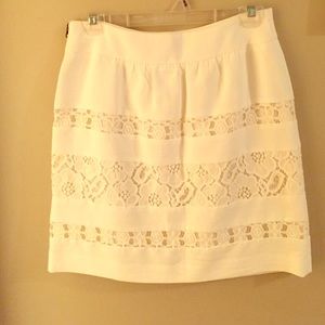 White skirt.
