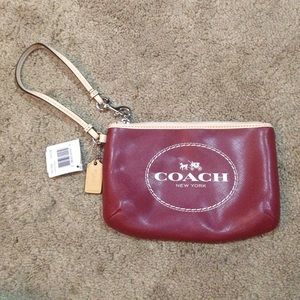 Coach horse and carriage medium wristlet