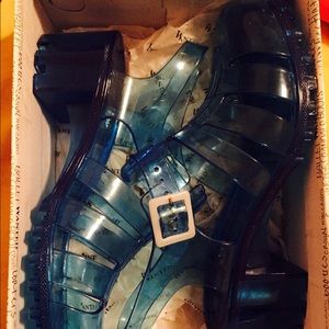 Gumball blue plastic shoes.