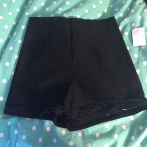 Black high waisted shorts with lace bottoms