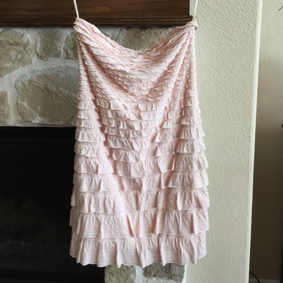 Light pink strapless, fitted ruffle dress