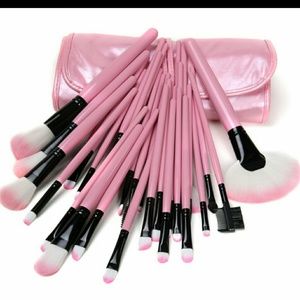 Pink makeup brushes