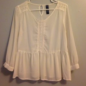 Francesca's white blouse