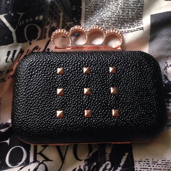 Rogue by Rihanna clutch