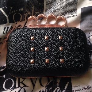 Rogue by Rihanna clutch