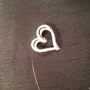 Sterling silver heart pendant.