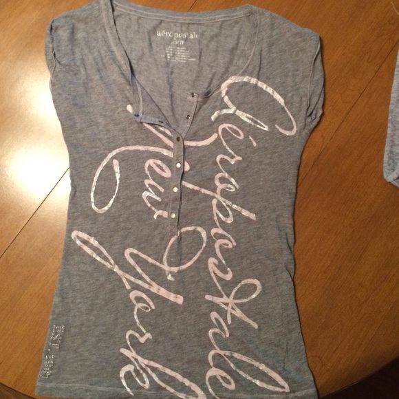 Grey with pink writing v-neck