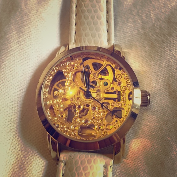 Akribos XXIV skeleton watch