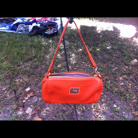 Dooney & Bourke orange leather purse.