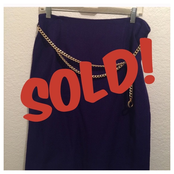 Skirt with gold chain belt