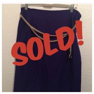 Skirt with gold chain belt