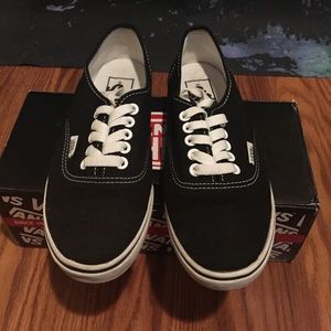 Black & white Lo Pro Vans