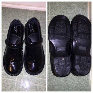 Patent Black Clogs