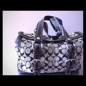 Black and white coach signature handbag
