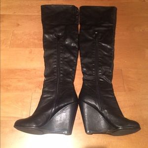 Over the knee black wedged boots