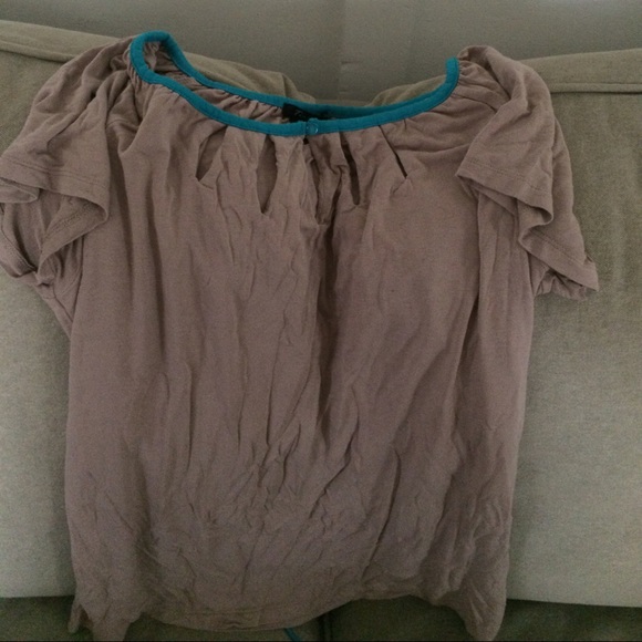 Tan w/ blue tie in back sz L shirt