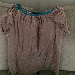 Tan w/ blue tie in back sz L shirt