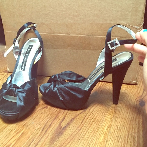 Black pumps with ankle strap