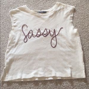 Brandy Melville "sassy" cropped muscle tank