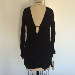 Reformation NWT black mini dress low v size XS