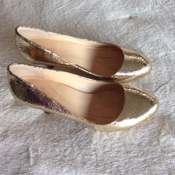 Kate Spade gold pumps