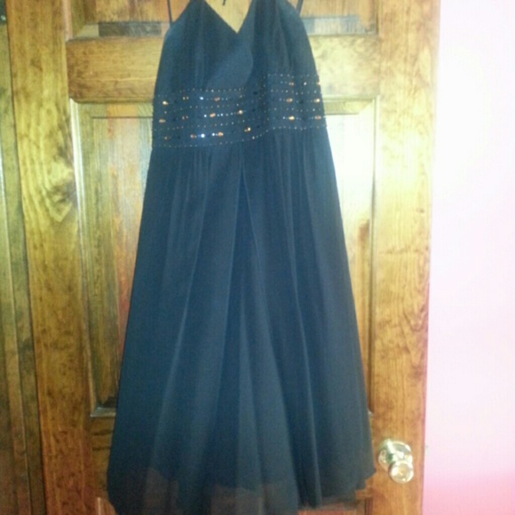 Black dress with embellishments on the top:)