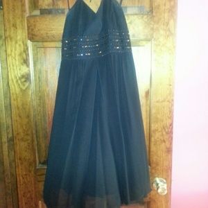 Black dress with embellishments on the top:)