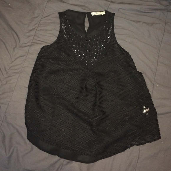 A black loose fitting tank top