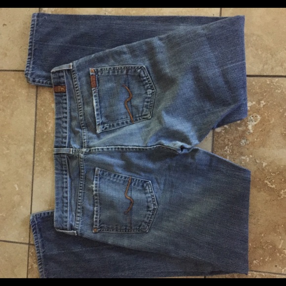Men's seven for all mankind jeans .