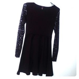 Little black dress with lace sleeves