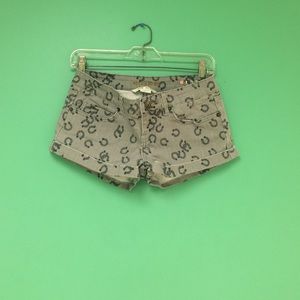 Gray low rise shorts black horse shoe detailing