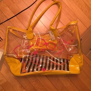 yellow and clear beach bag