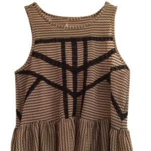 SOLD- Free people peplum tank w/ cut out