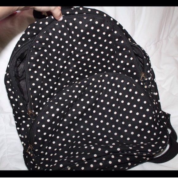 Black polka dot bookbag