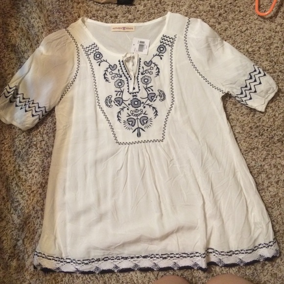 Small altar'd state shirt-tags still on