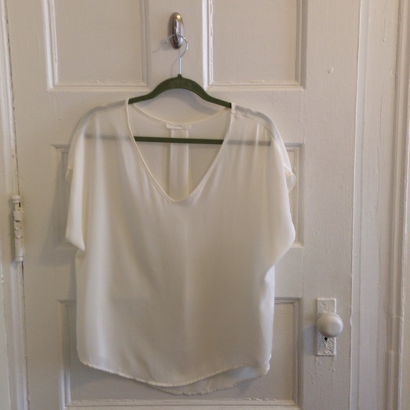 Sheer, off-white blouse