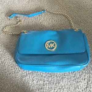 Michael kors teal cross body.