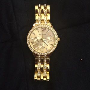 Gold Geneva watch