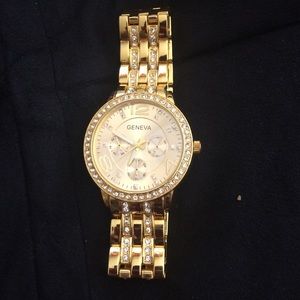 Gold Geneva watch