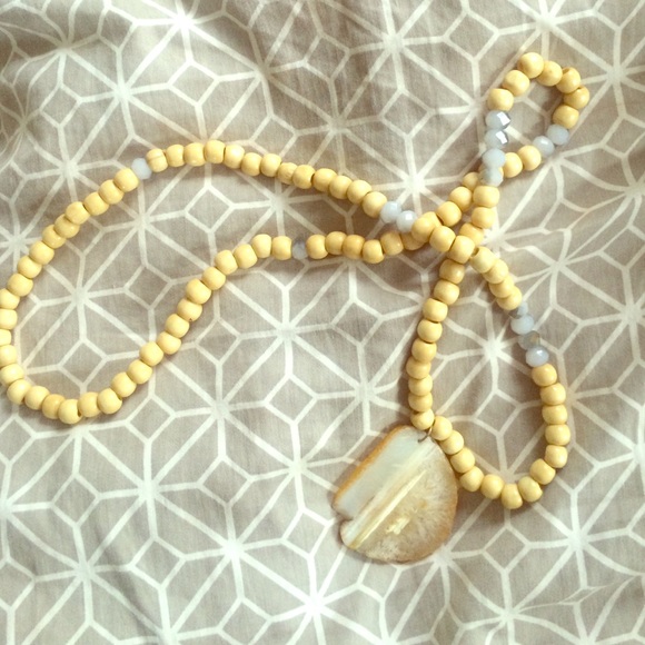 Long wooden beaded necklace with Agate slice