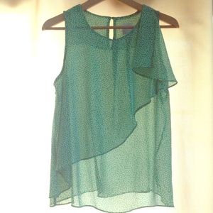 Beautiful gauzy sleeveless blouse. Size 8.