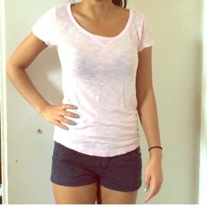 An extra small light pink aerie shirt