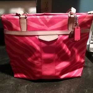 Salmon colored canvas handbag