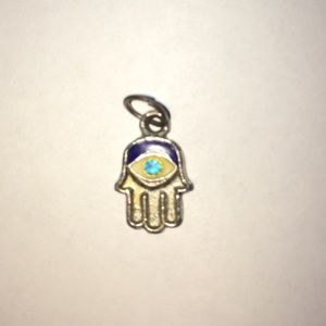 "All seeing eye" on a hand pendant.
