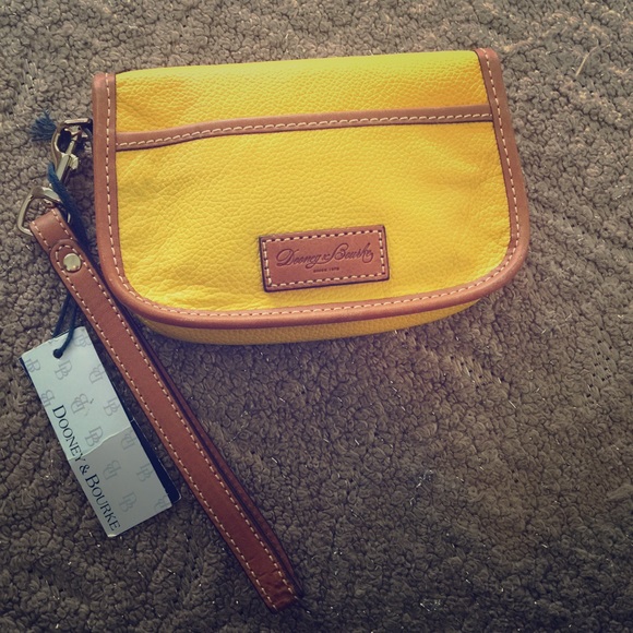 Authentic Dooney & Bourke leather wristlet.