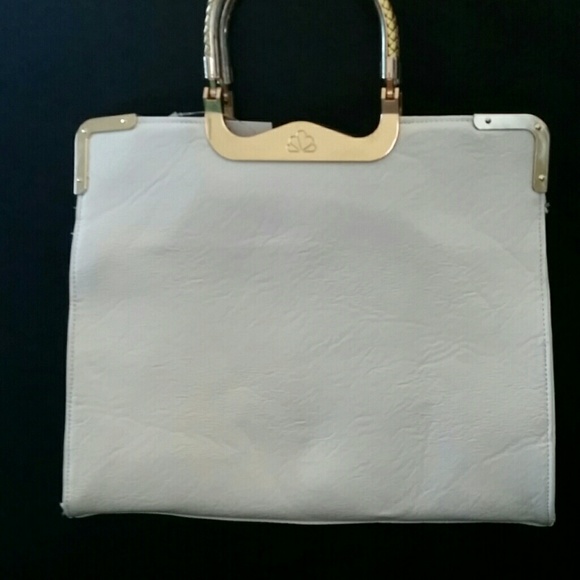 Matte white handbag with gold trim