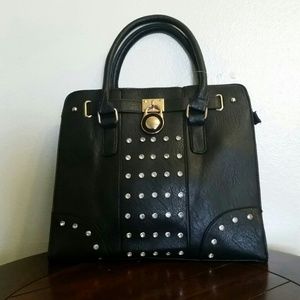 Black studded handbag