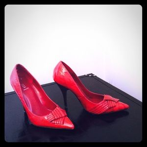 Bakers red patent leather pumps.
