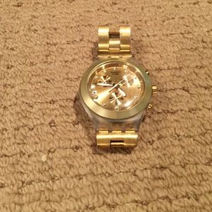 Gold Swatch watch